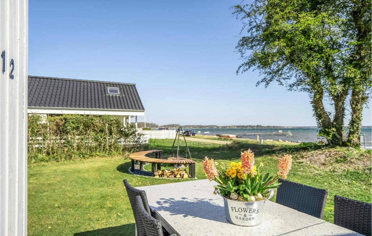 Beach Front Home In Sjolund With Kitchen Exterior photo