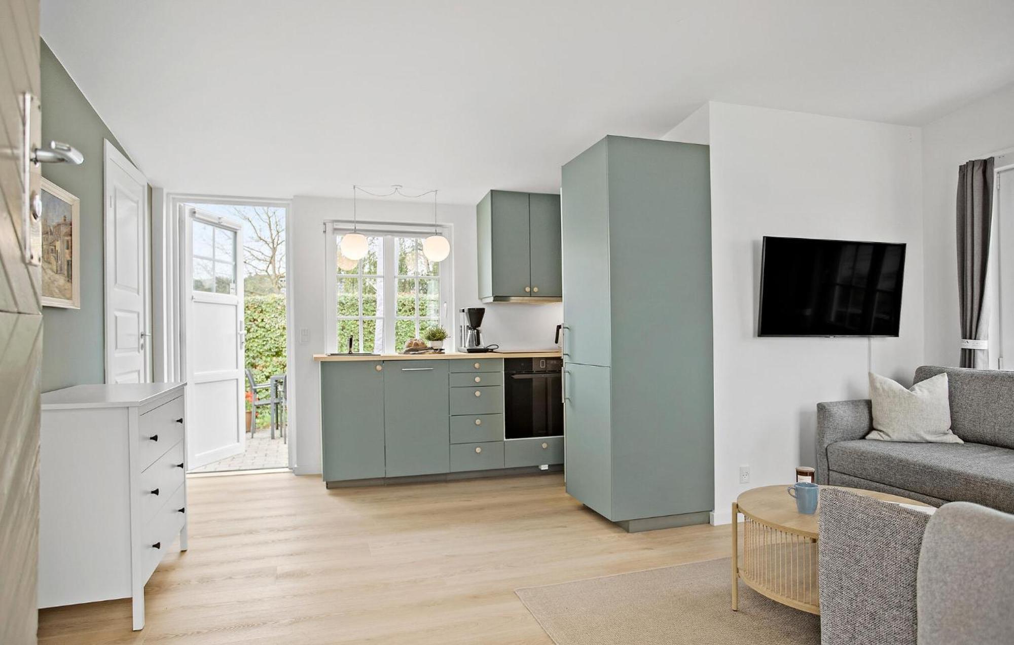 Beach Front Home In Sjolund With Kitchen Exterior photo